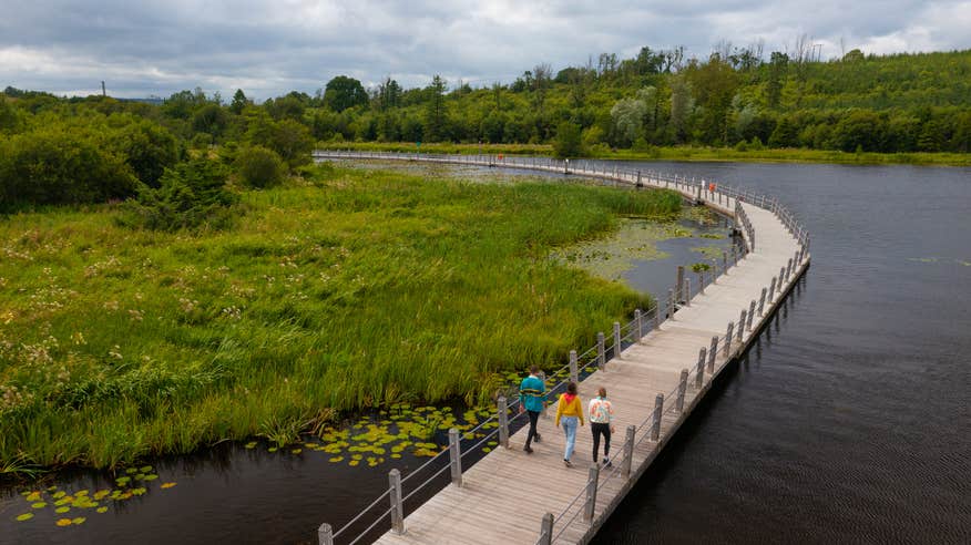 Amble along the floating boardwalk over the Acres Lake.