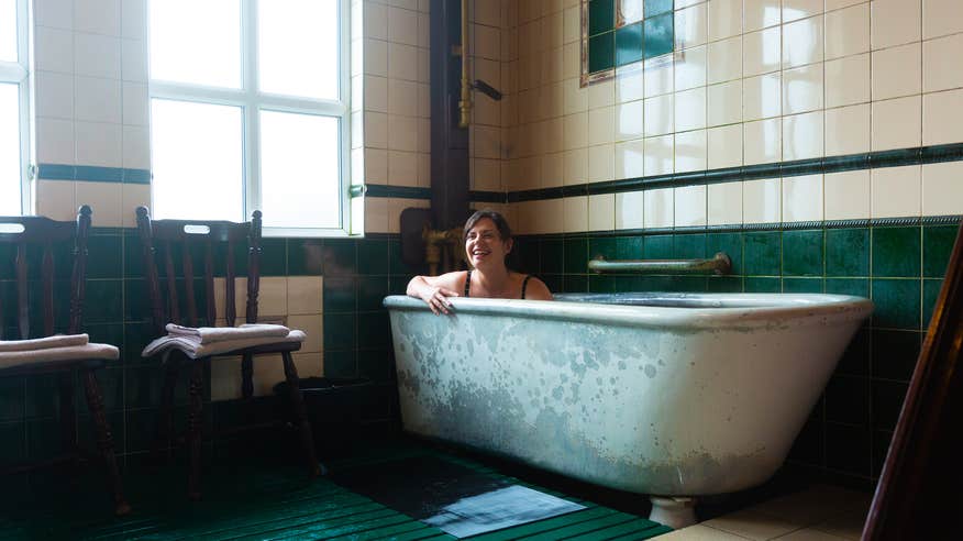 A woman in a seaweed bath at the Kilcullen Seaweed Baths in Enniscrone, County Sligo.